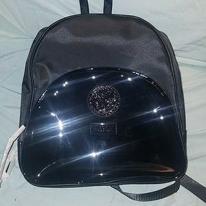 Authentic...Black small/medium sized backpack.